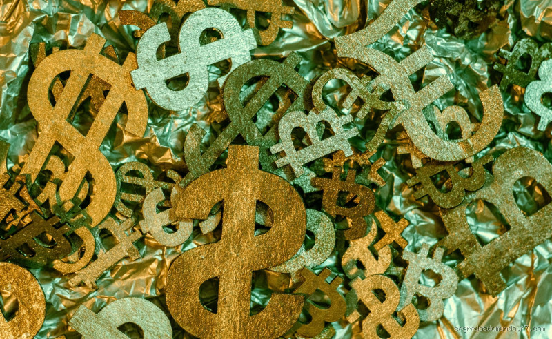 Qual a origem do $? A história por trás do símbolo do dólar